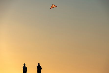 People flying kites near the cliffs at Kalbarri