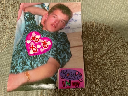 A card with a photo of a young man.