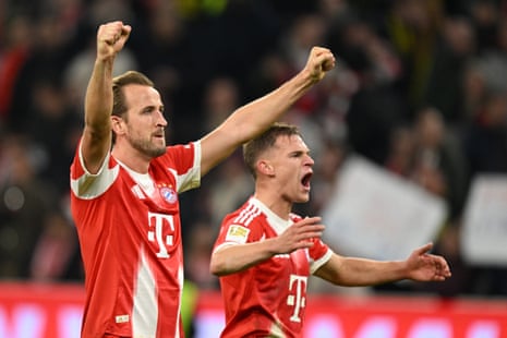 Bayern Munich players Harry Kane and Joshua Kimmich celebrate