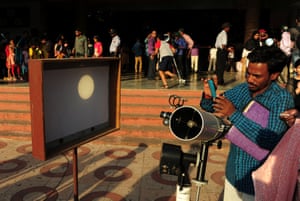 Mercury’s transit is seen on a screen in a reflection from a telescope at the Birla planetarium in Chennai
