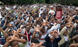Oromo people stage a protest against the government near the Hora Lake at Debre Zeyit