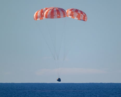 Nasa’s Orion capsule carrying the Artemis II crew as it is about to splash down on 10 April 2026.