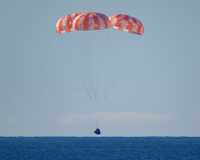Jubilant return of Artemis II shadowed by ‘extinction-level’ cuts to Nasa: ‘It’s discordant’