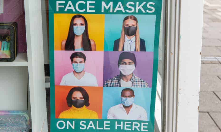 Face masks poster outside a UK shop