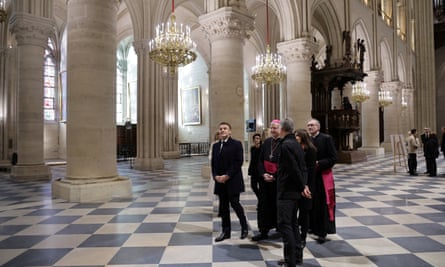 Emmanuel Macron and Brigitte Macron during their visit to Notre Dame in Paris