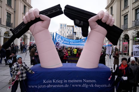 Protesters march during a demonstration against the Munich Security Conference in Munich, on Saturday.