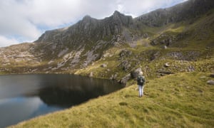 Jenny explores the Snowdonia landscape. The writer walks amid the mountains and lake at Llynnau Cwm Silyn.