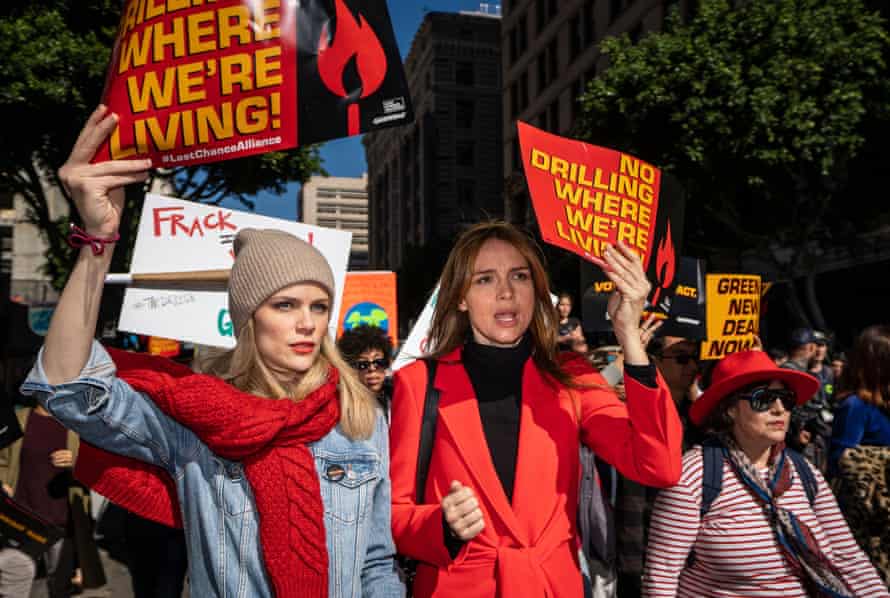 Brooklyn Decker and Burrows take part in the Fire Drill Friday protest in LA earlier this month.