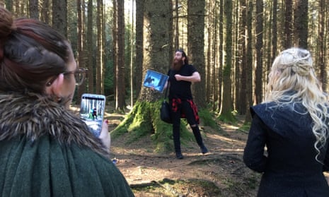 Eric Nolan, centre, shows Game of Thrones filming locations in Tollymore forest