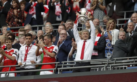 Arsene Wenger, Manager of Arsenal, lifts The FA Cup