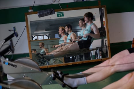 Members of the Cambridge University Boat Club men’s squad using a mirror to look at their technique during a session on ergo machines at the Goldie boathouse in Cambridge during February 2024.