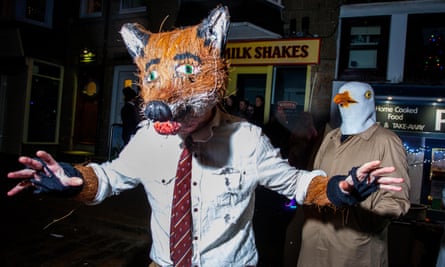 New Year’s Eve, St Ives, Cornwall. Partygoers flood the streets of the Cornish fishing village in fancy dress