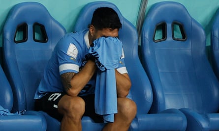 Luis Suárez cries after Uruguay are knocked out despite beating Ghana.