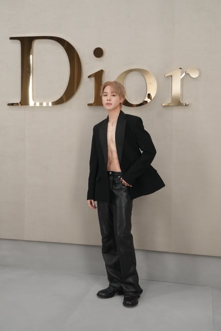 Jimin under a Dior sign