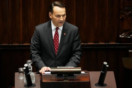 Radek Sikorski gives a speech at the Polish parliament