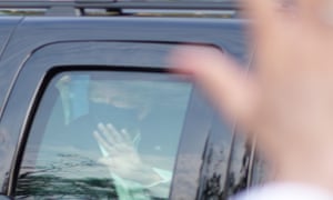 Donald Trump waves at his supporters outside Walter Reed Army Medical Center in Bethesda, Maryland.