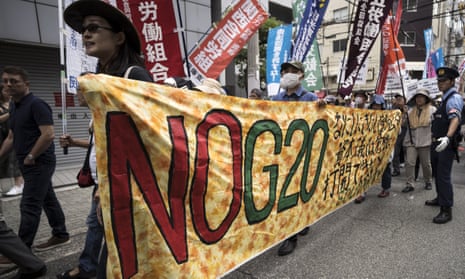 Demonstrators protest against the G20 summit in Osaka where Donald Trump and Xi Jinping are expected to have talks on the US-China trade dispute.