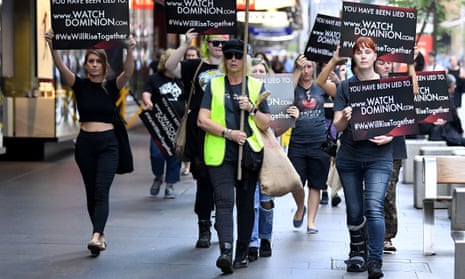 Animal rights protesters march through the business district in Sydney in April