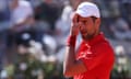 Novak Djokovic struggles during his defeat at the Italian Open