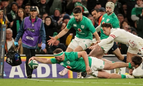 Ireland's Rob Herring scores their fourth try.
