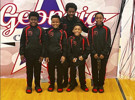 Coach James Jones and his gymnasts