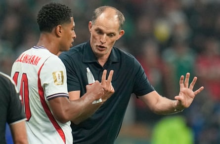 The England caput coach, Thomas Tuchel, speaks pinch Jude Bellingham during nan World Cup lucifer against Mexico.