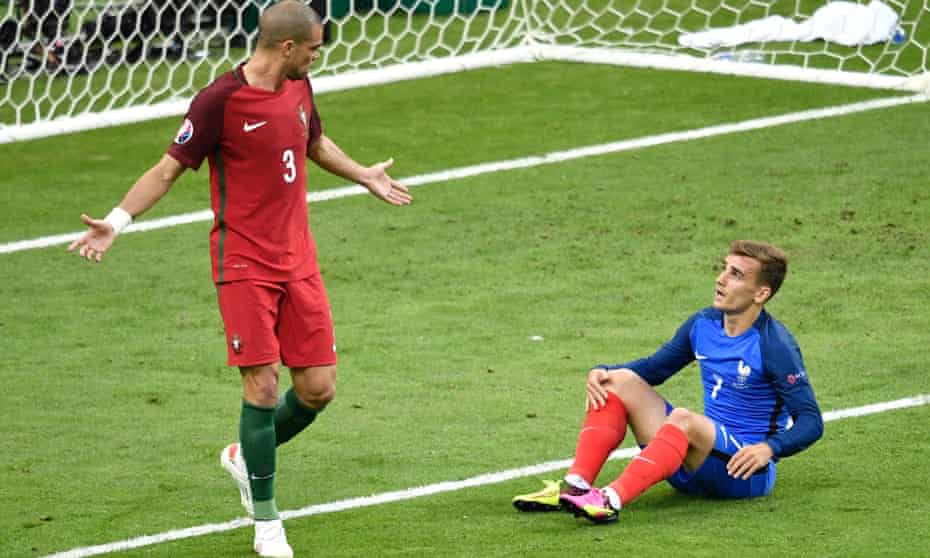 Portugal defender Pepe reacts towards Antoine Griezmann during the Euro 2016 final.