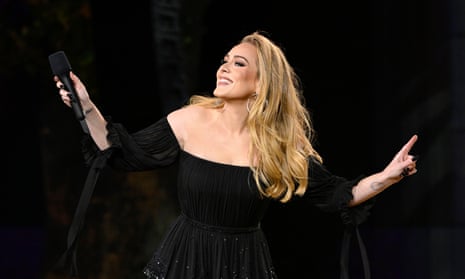 Adele performs on stage in Hyde Park
