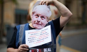 Simon Davies in a Boris Johnson mask