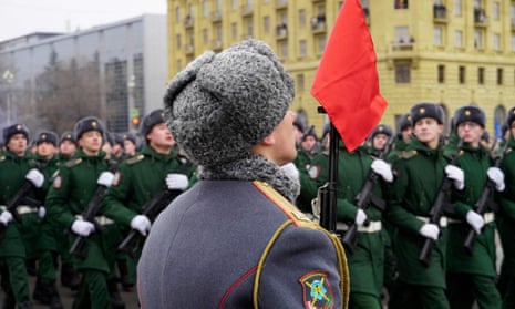 Russian servicemen march during the military parade