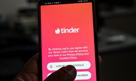 tinder logo on phone screen