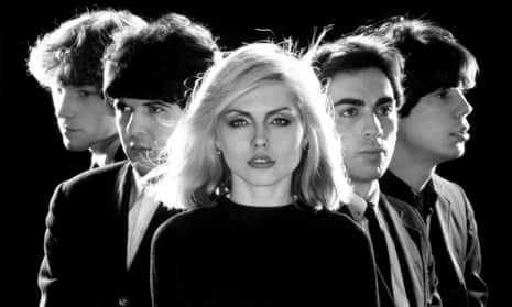 Head and shoulders portrait of Debbie Harry and the four other members of the pop group Blondie, from 1977