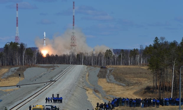 Cosmodrome employees watch the launch of a Russian rocket at Vostochny cosmodrome in 2016.
