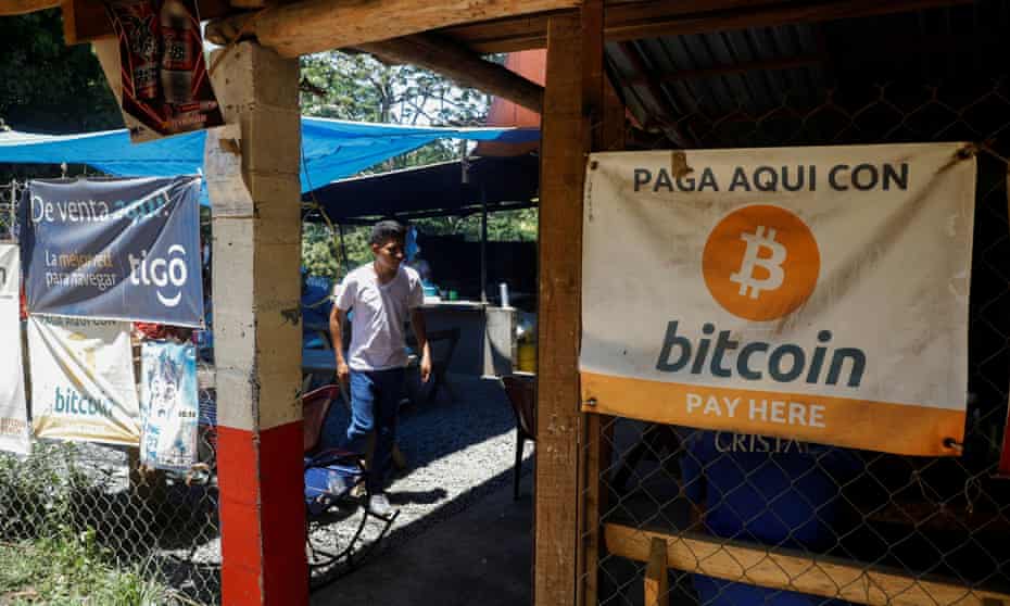 Bitcoin banners are seen outside a restaurant in Chiltiupán, El Salvador.