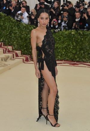Zoe Kravitz's black Saint Laurent dress served double time. The left side of the actor's gown was all long-sleeved lace, yet the right side was held together with just two strategically placed ribbons.
