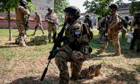 Members of a foreign volunteers unit fighting in the Ukrainian army take positions in Sievierodonetsk, Luhansk region of Ukraine June 2, 2022.