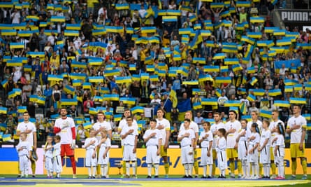 Ukraine sing the national anthem before their friendly against Borussia Mönchengladbach in preparation for their World Cup playoff