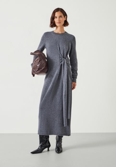 Model wearing a grey tie waist knitted dress.