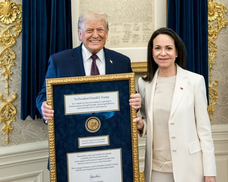 María Corina Machado presents Trump with her Nobel peace prize medal | María Corina Machado | The Guardian