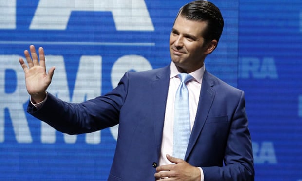 Donald Trump Jr waves from the stage at an NRA forum in Dallas, Texas, on 4 May.