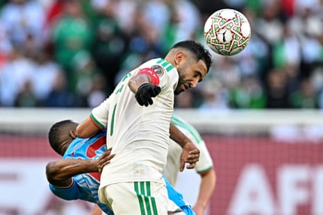 Riyad Mahrez goes up for a header