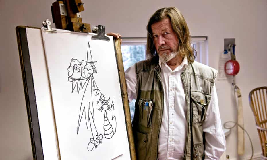 Jan Pienkowski at home in his west London studio in 2010, with a drawing of Meg, Mog and Owl.