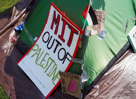 signs read ‘MIT out of Palestine’ and ‘viva via Palestina’