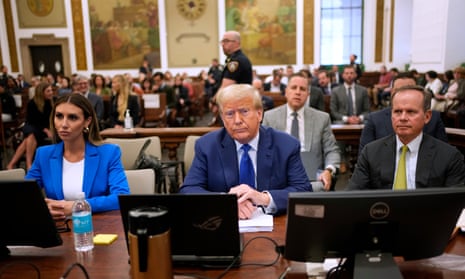 Donald Trump sits in court with his attorneys during his civil fraud trial on Wednesday in New York, New York.