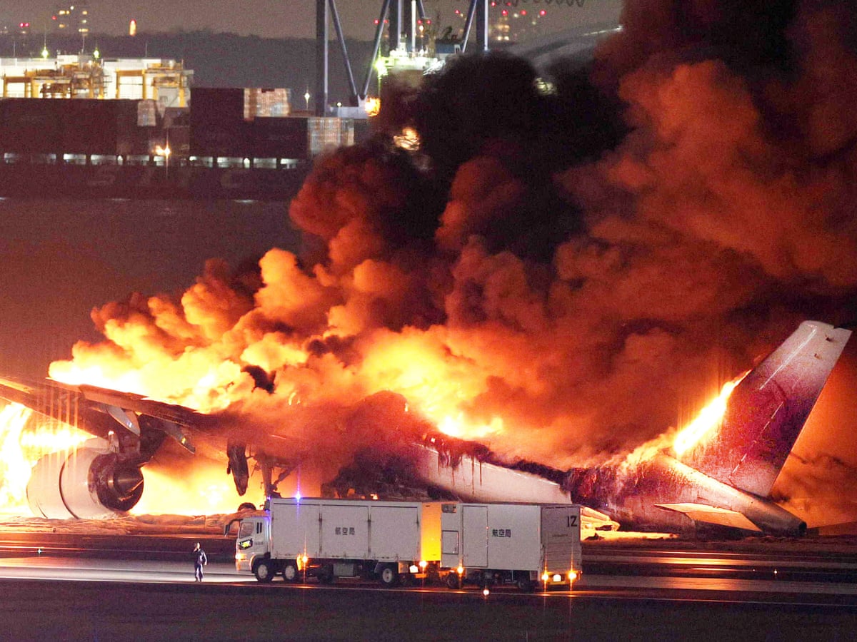 Miracle' escape for passengers after horrific runway crash at Tokyo airport | Japan | The Guardian