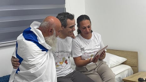 Released Israeli hostage, Omri Miran, is reunited with his wife, Lishay Miran-Lav, and father, Dani Miran, in Re’im, Israel.