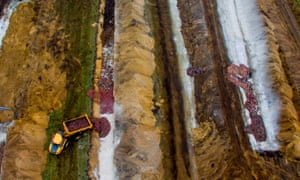 An aerial view shows thousands of killed mink being buried in a field outside the western town of Holstebro.