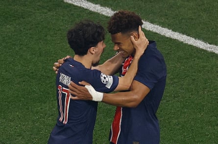 Vitinha celebrates with Désiré Doué after the latter scored PSG’s second against Inter