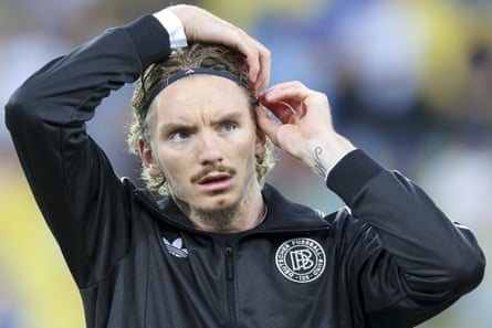 Nick Woltemade warms up for Germany