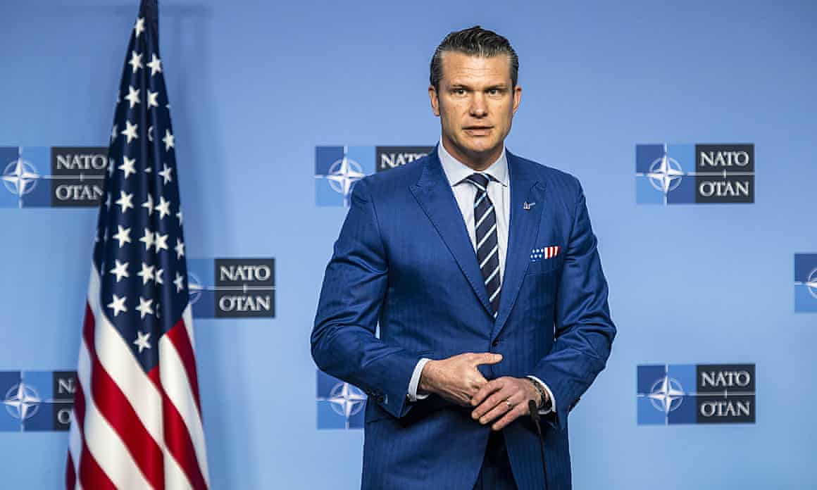 Hegseth stands by US flag against blue Nato backdrop